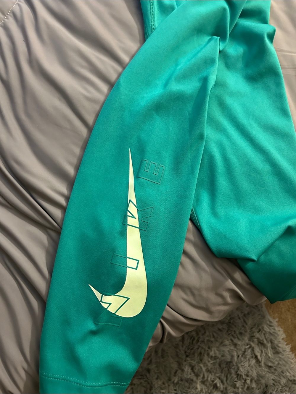Nike Teal Leggings with Pale Yellow Swoosh
